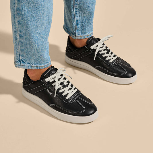 OluKai Women | Hā‘upu Women’s Leather Sneakers - Onyx
