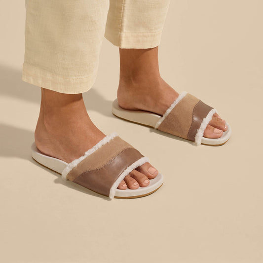 OluKai Women | Hō‘ala Slide Women’s Slide Slipper Sandals - Tan / Puka