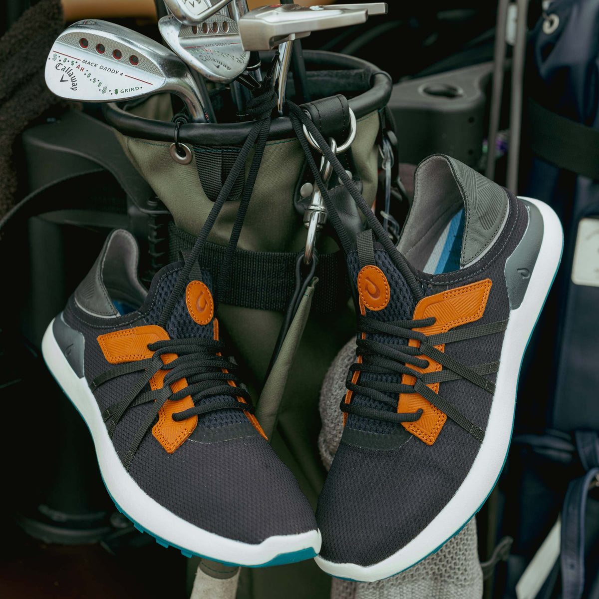 OluKai Men | Manele Men’s Breathable Golf Shoes - Black / Dark Shadow