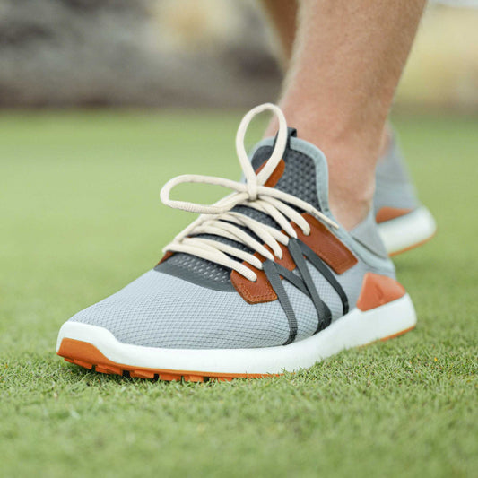 OluKai Men | Manele Men’s Breathable Golf Shoes - Pale Moss / Molten Orange