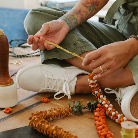 OluKai Women | Pehuea Lī ‘Ili Women's Leather Sneakers - White