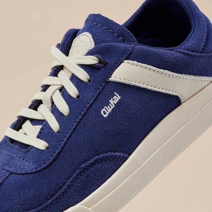 OluKai Women | Hā‘upu Women’s Leather Sneakers - Navy / Off White