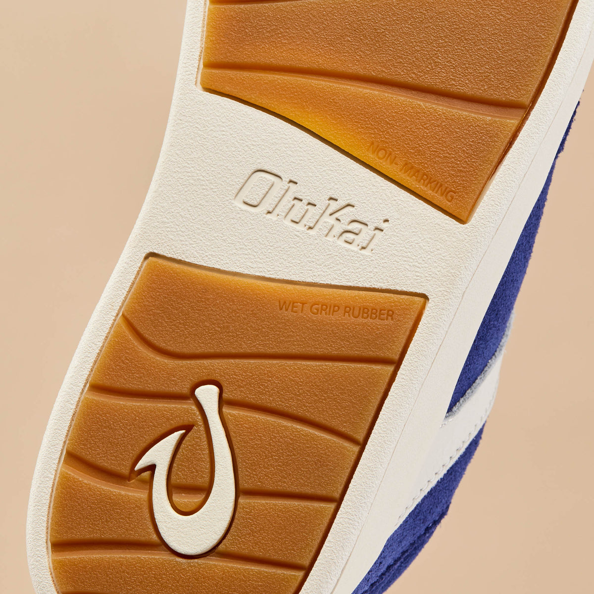 OluKai Women | Hā‘upu Women’s Leather Sneakers - Navy / Off White