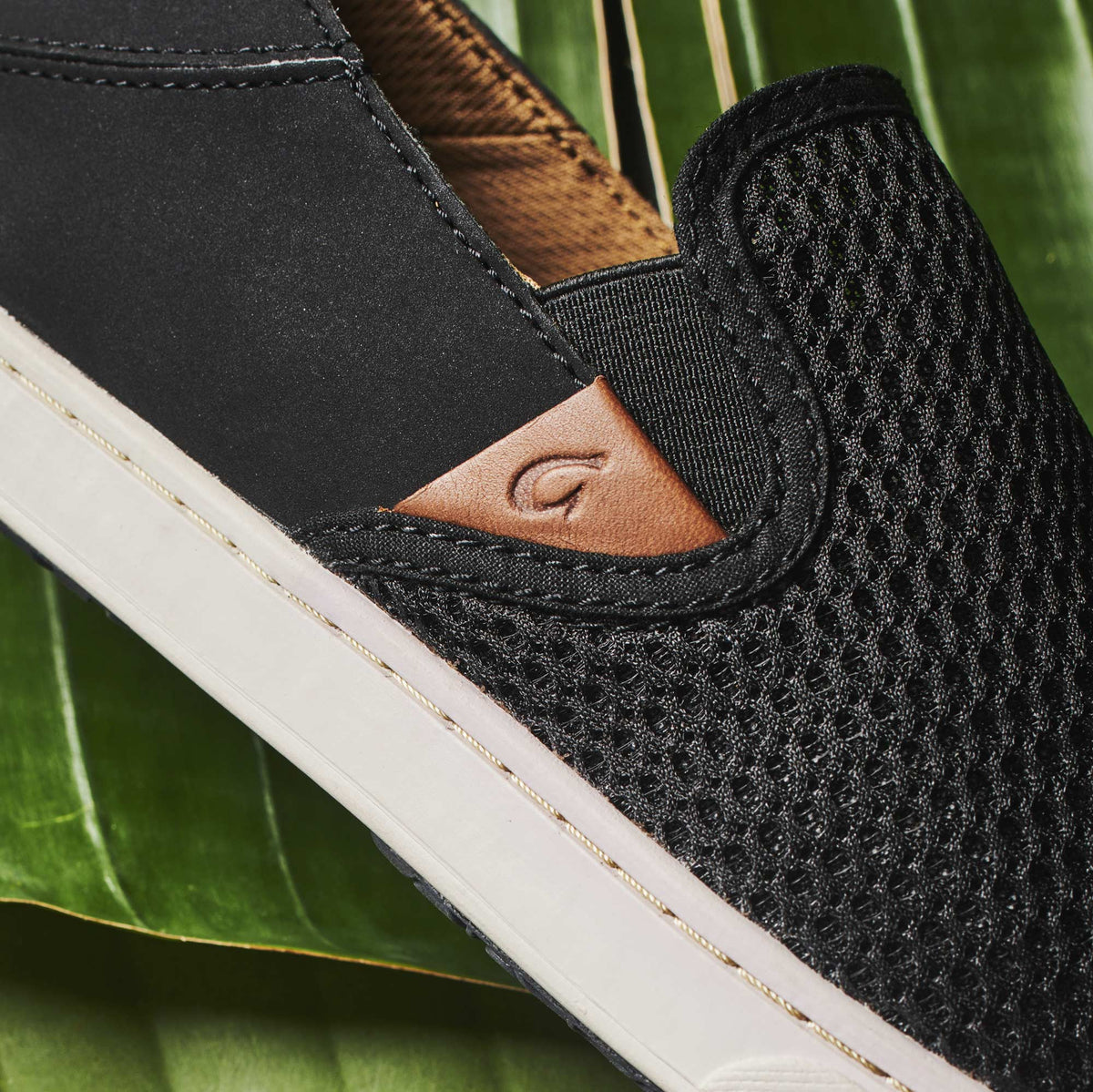 OluKai Women | Pehuea Women's Breathable Slip-On Sneakers - Black