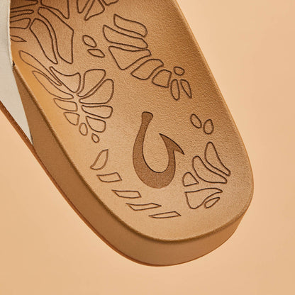 OluKai Women | Kipe‘a ‘Olu Women‘s Slide Sandals - Puka / Tan