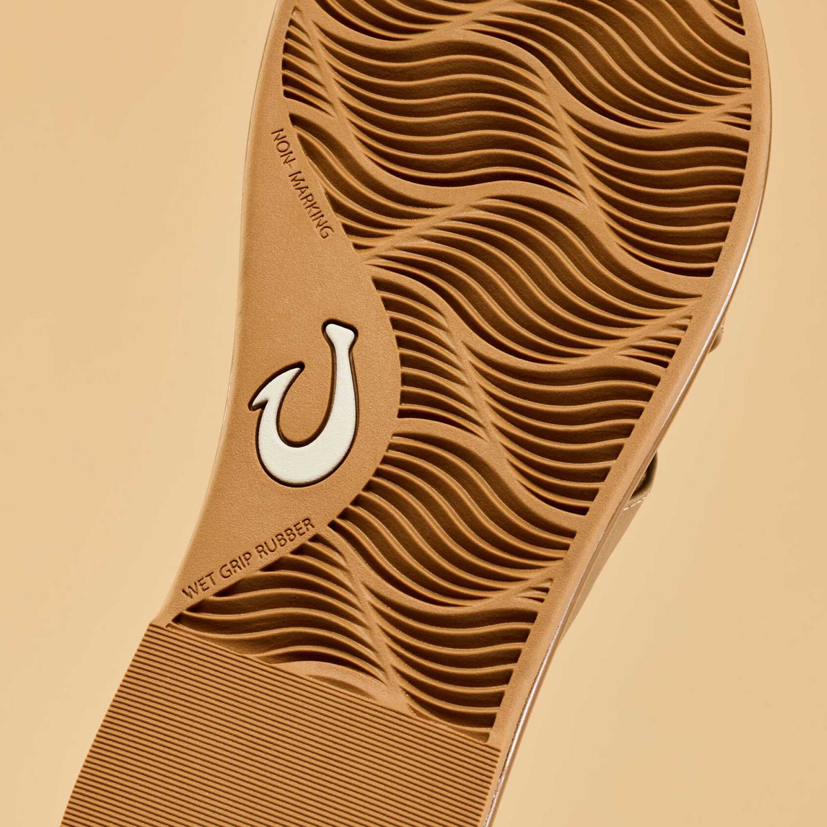 OluKai Women | La‘i Slide Women’s Slide Beach Sandals - Tan